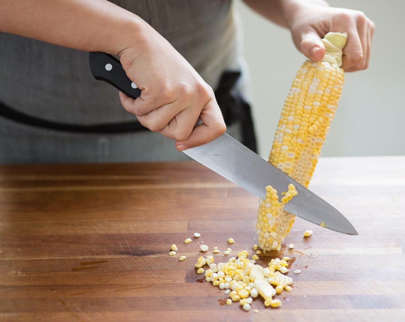 step 8 Slice the Corn Cob (1) and set aside. Strain and rinse the Black Beans (1 can) in a colander; hold for plating.