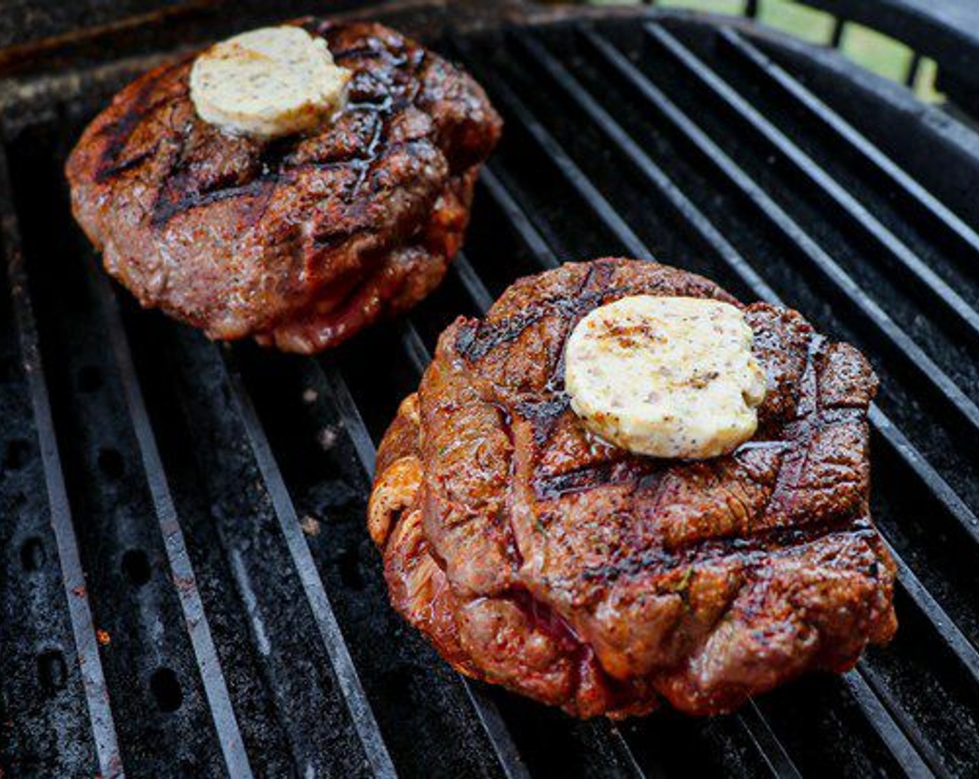 step 5 Flip steak over and top each one with 1 Tablespoon of Steak Butter.