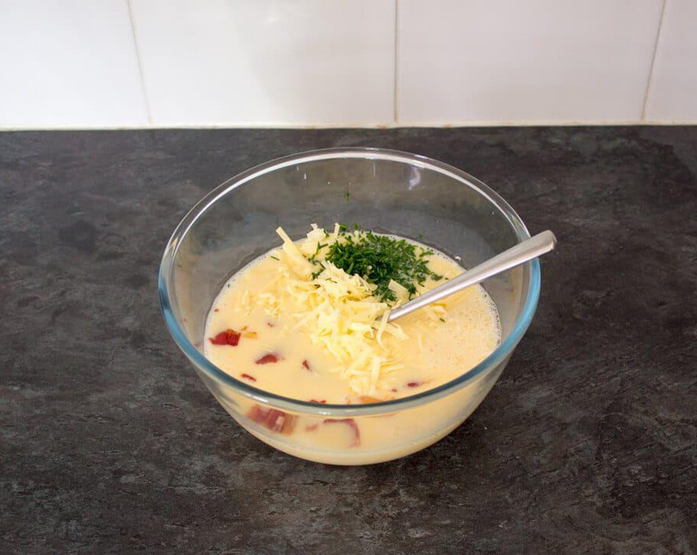 step 5 Then mix in the Chopped Bacon, Aged Cheddar Cheese (1/2 cup), Fresh Chives (1 Tbsp) and a good pinch of Salt (to taste).