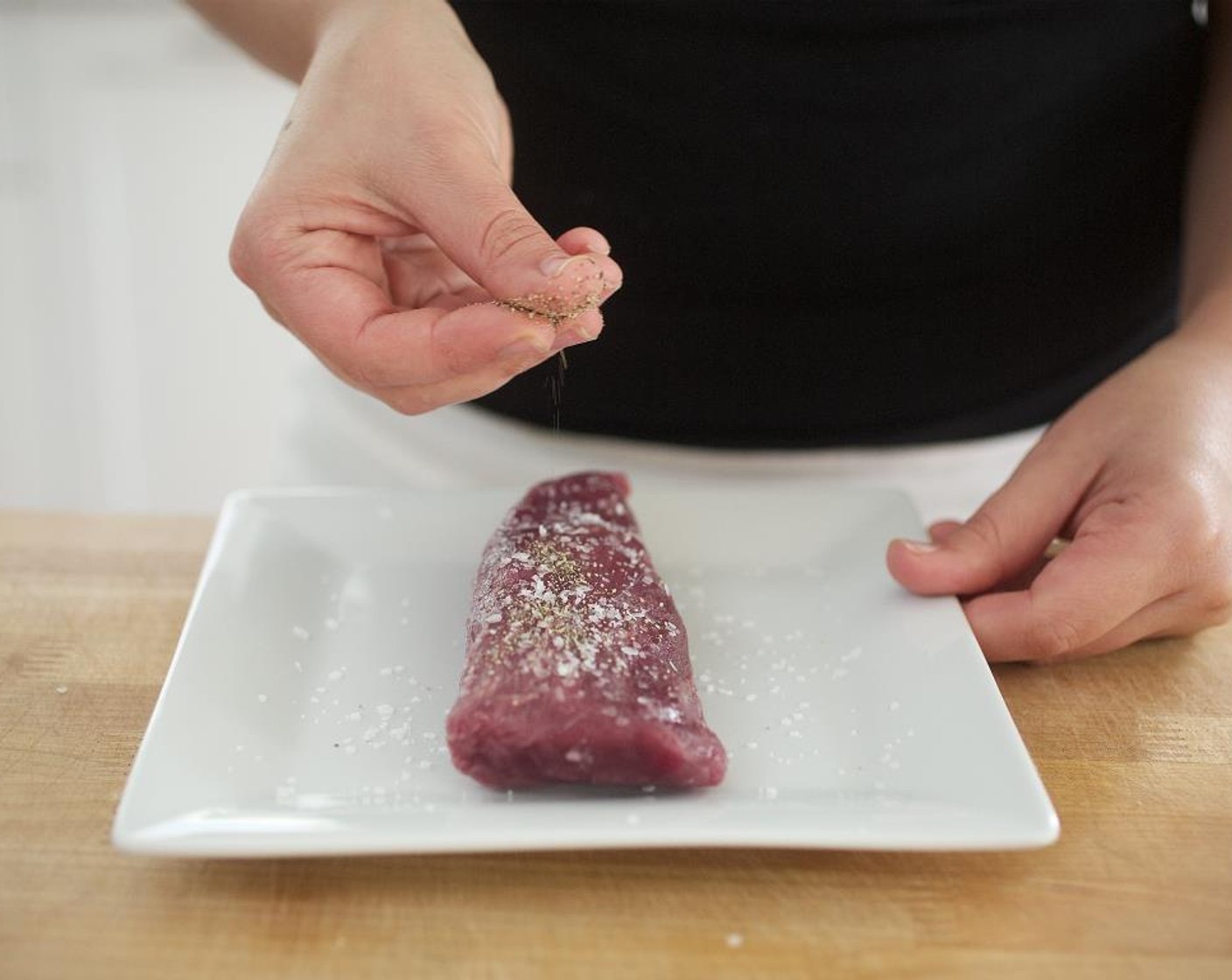 step 7 Pat the Beef Tenderloin (8 oz) dry with paper towels and season both sides with Salt (1/4 tsp) and Ground Black Pepper (1/4 tsp).