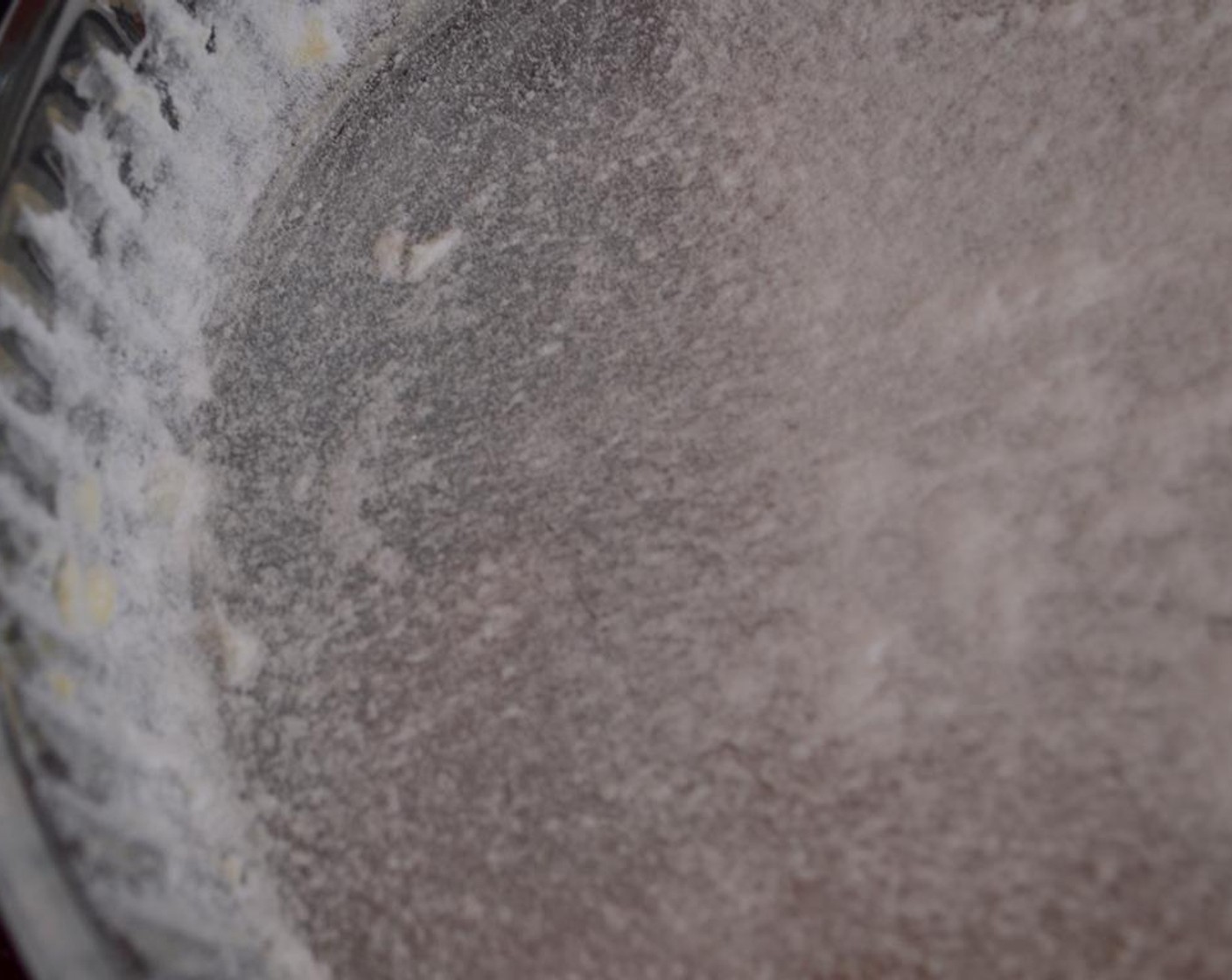 step 1 Line the interior of a glass baking dish with Butter (1 tsp) and sprinkle with spoonful of Powdered Confectioners Sugar (to taste).