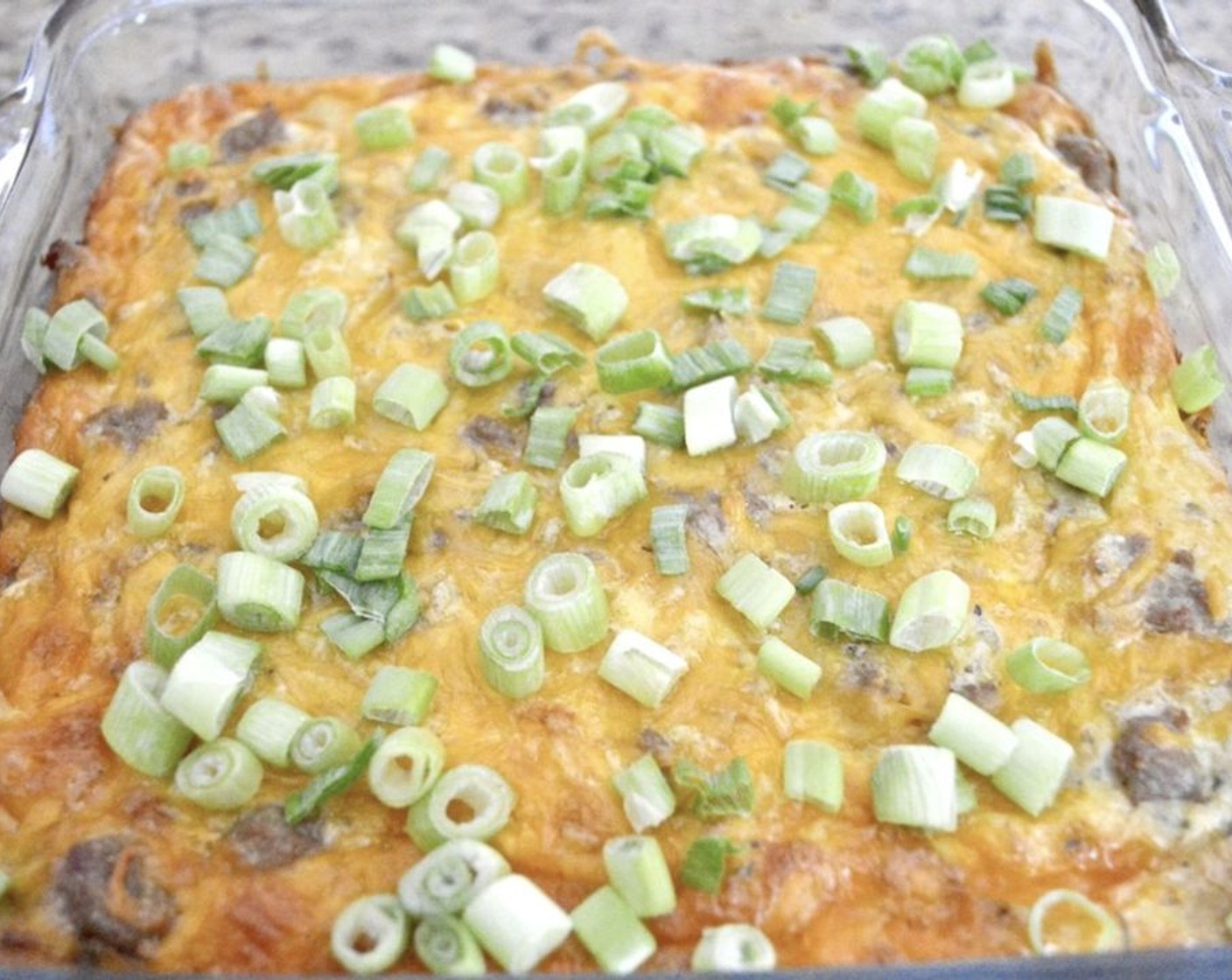 step 6 Sprinkle the Scallion (1 bunch) on top and let the casserole cool and set for 10 minutes.