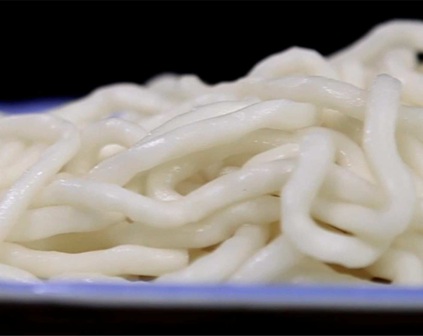 step 2 Boil the Fresh Potato Noodles (6 oz) separately for about 1-2 minutes, drain them and put into the bottom of the bowl with boiled and drained enoki mushrooms.