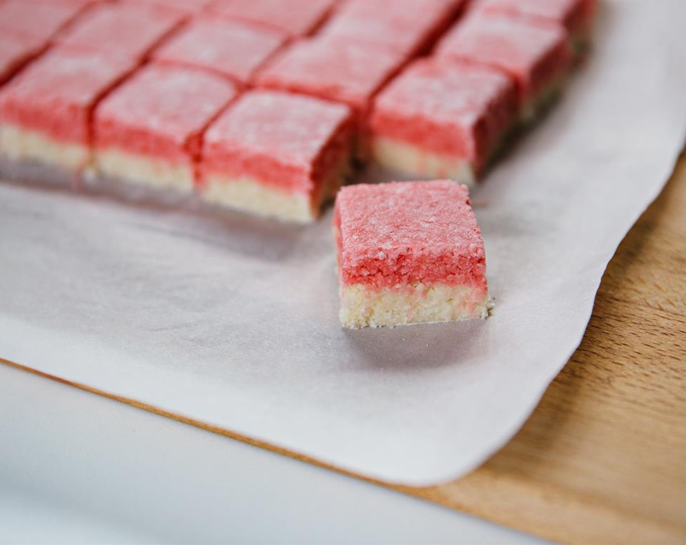 step 12 Once the coconut ice is dry, cut into small squares. Serve and enjoy!