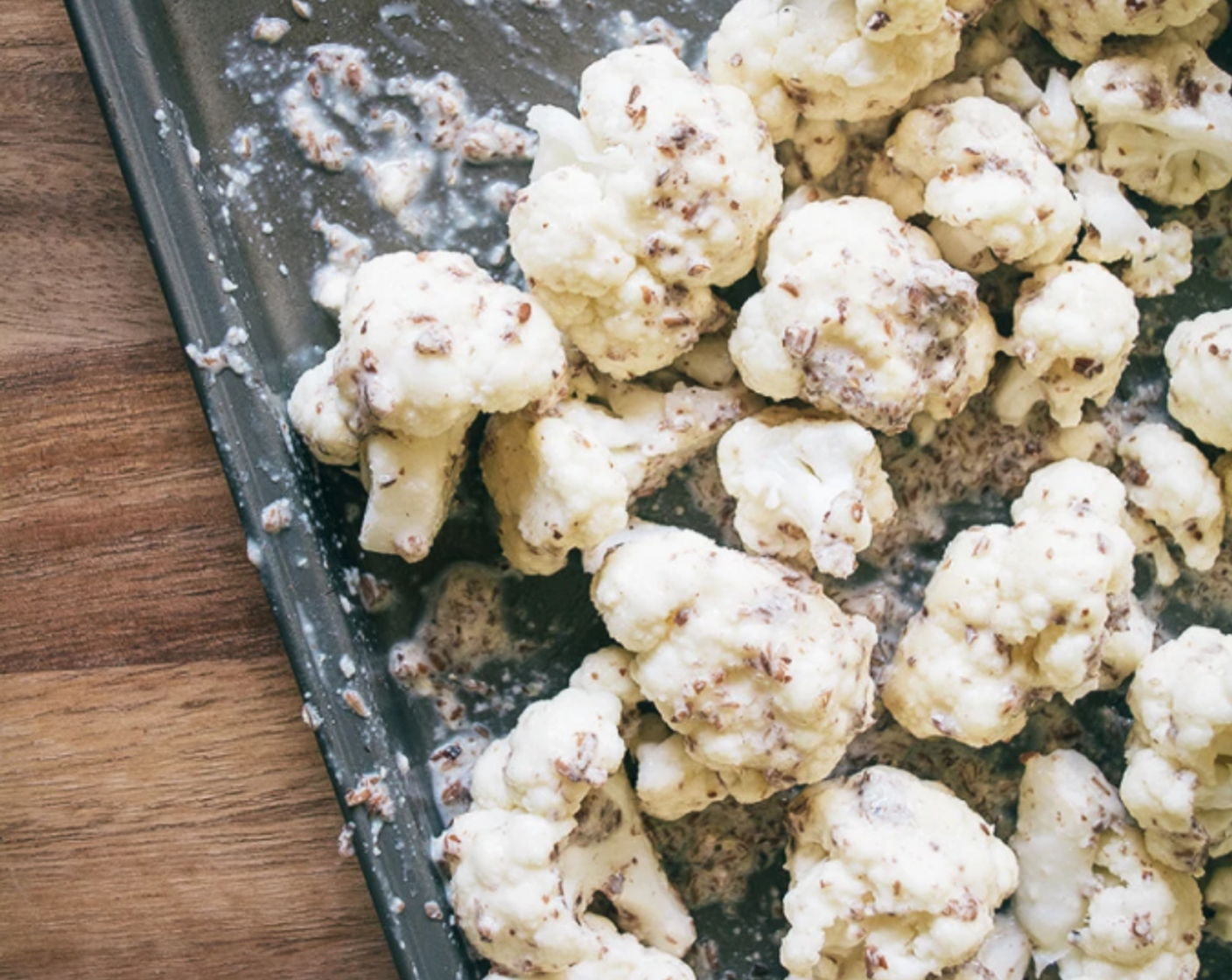 step 5 Drizzle the almond meal batter over cauliflower and toss to thoroughly coat.