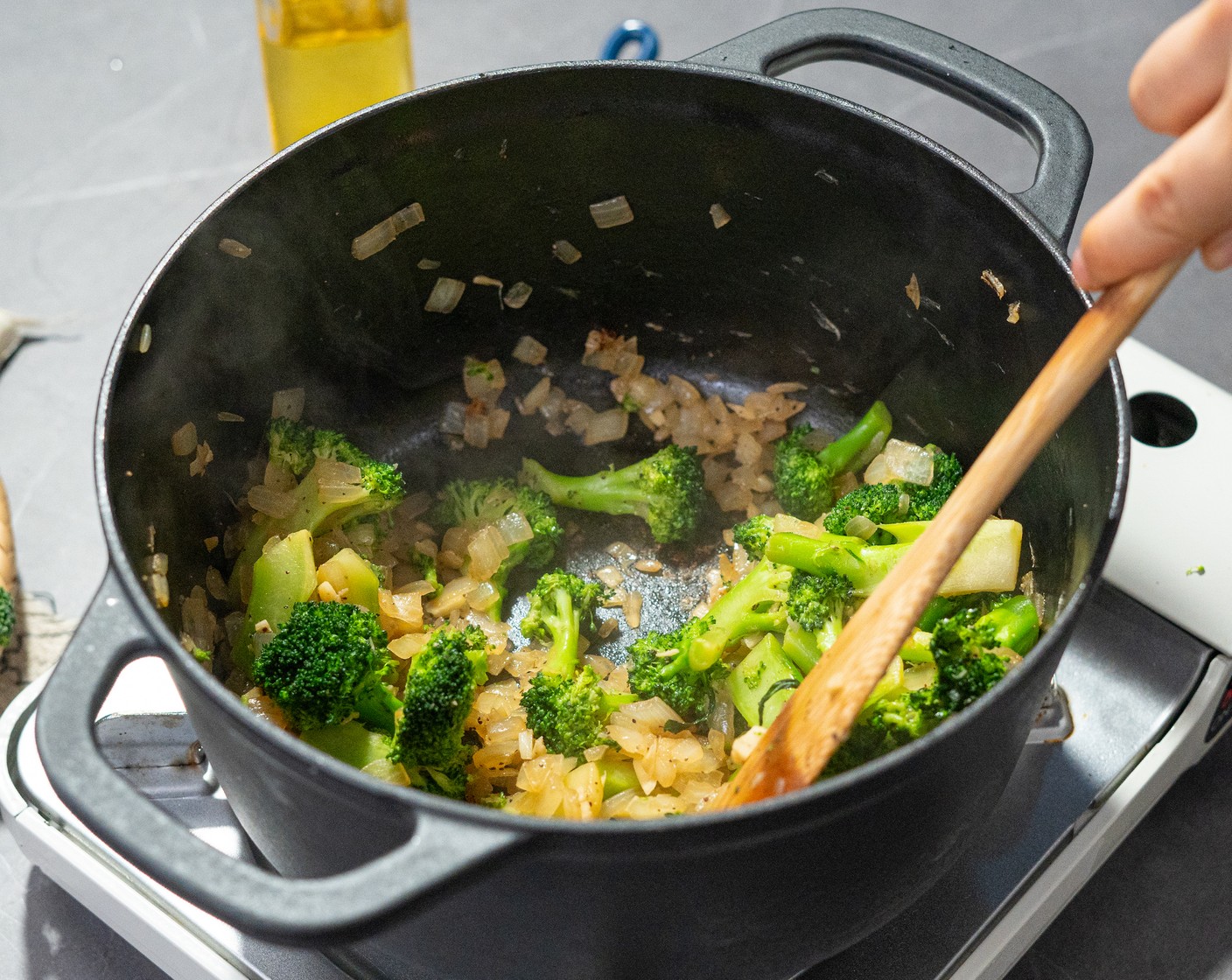 step 2 Add the Broccoli (1 head) and season with Salt (1/2 tsp) and Ground Black Pepper (1/2 tsp). Cook for 8-10 minutes, or until the broccoli is crisp and tender.