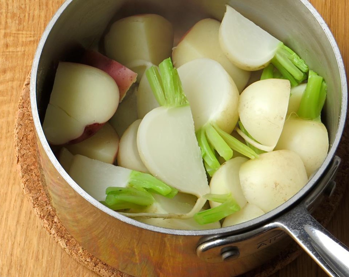 step 5 Fill a medium pot with water and Kosher Salt (1 tsp) and bring to a boil. Add potatoes and turnips, reduce heat to a rapid simmer and cook vegetables until tender, about 15 minutes. Drain.