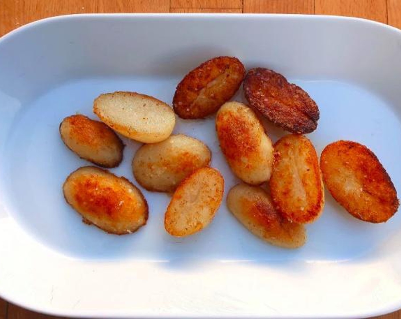 step 4 Plate the potatoes on a serving dish, reserve the pork on a warm plate