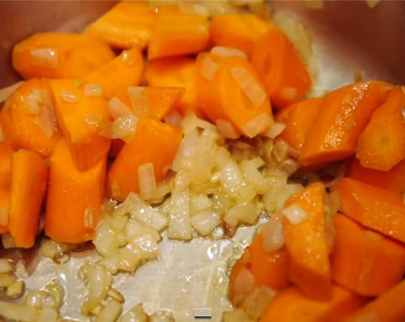 step 5 Add the carrots to the onion. Saute them together for 2 minutes.