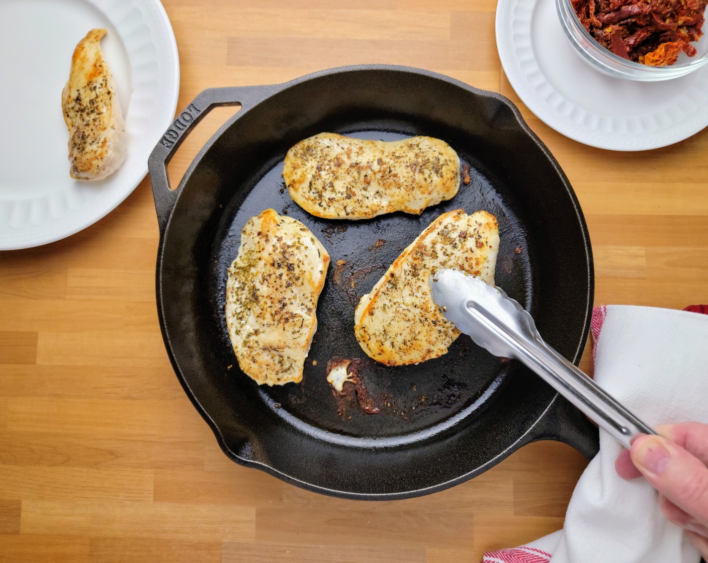 step 5 Add Olive Oil (1 Tbsp) to a large saucepan over medium-high heat and cook the chicken breasts for 4 to 5 minutes on each side, until nicely brown. Remove the chicken from the pan and set aside.