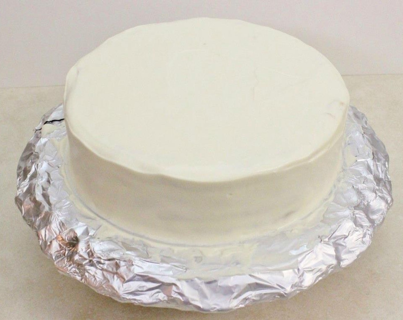 step 15 Cover the top and sides with the reserved frosting.