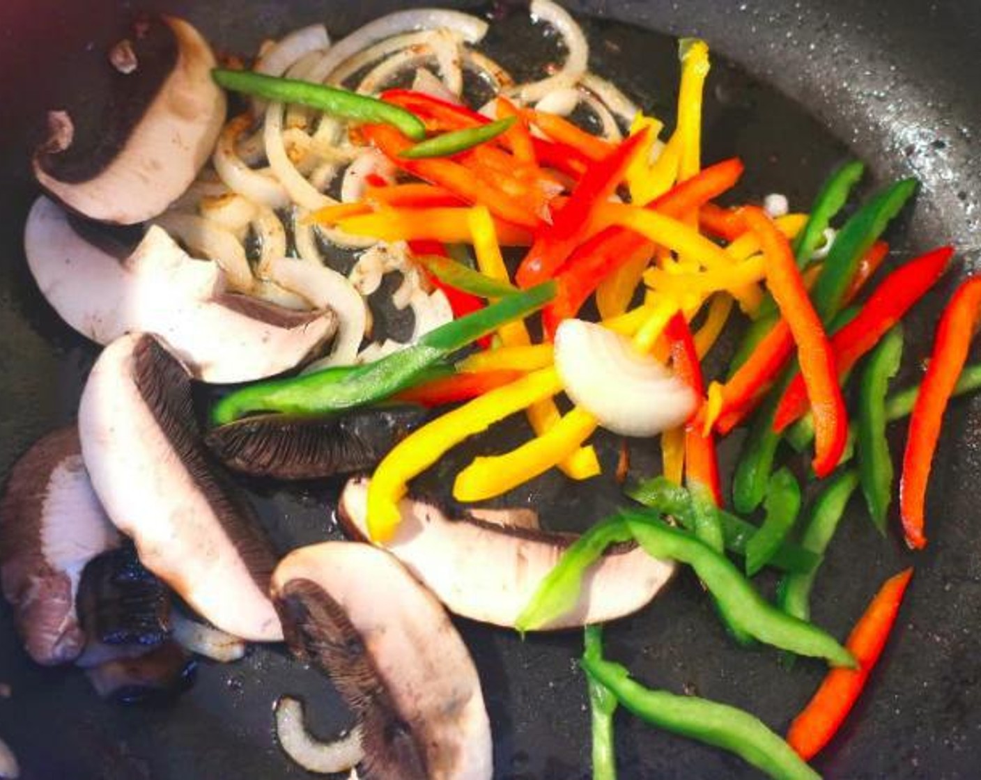 step 5 In the same pan, add some more Extra-Virgin Olive Oil (as needed) and sauté Bell Pepper (1/2) together with Onion (1/2) and Cremini Mushrooms (6). Season with Kosher Salt (to taste) and Cayenne Pepper (to taste).