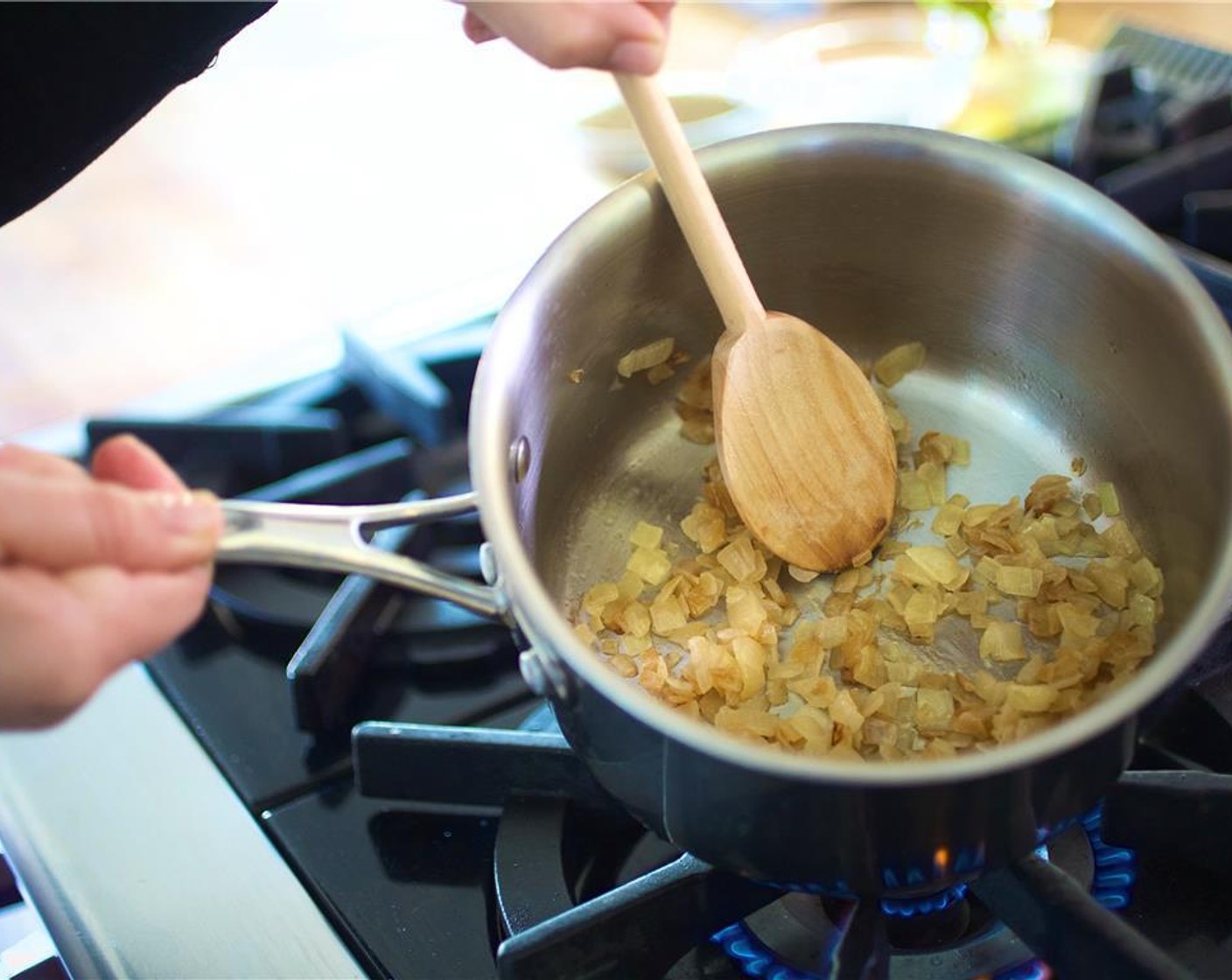 step 5 Add the small onion and continue cooking until soft and translucent. Stir occasionally as it cooks.