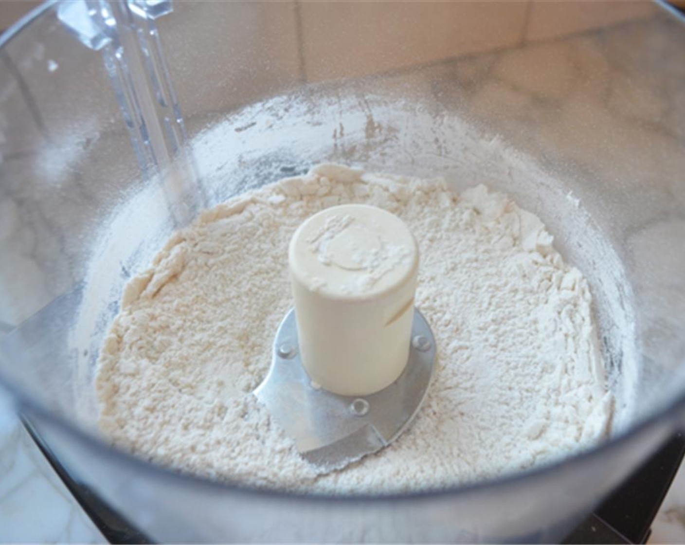 step 1 Combine the All-Purpose Flour (1 1/2 cups), Granulated Sugar (1 Tbsp), Salt (1/2 tsp), and Baking Powder (1/8 tsp) in a food processor and pulse.