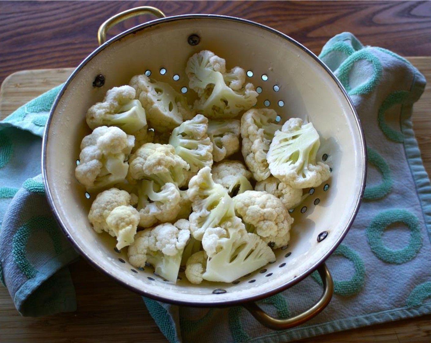 step 1 Remove the stems from the Cauliflower (1/2) and cut int into pieces.