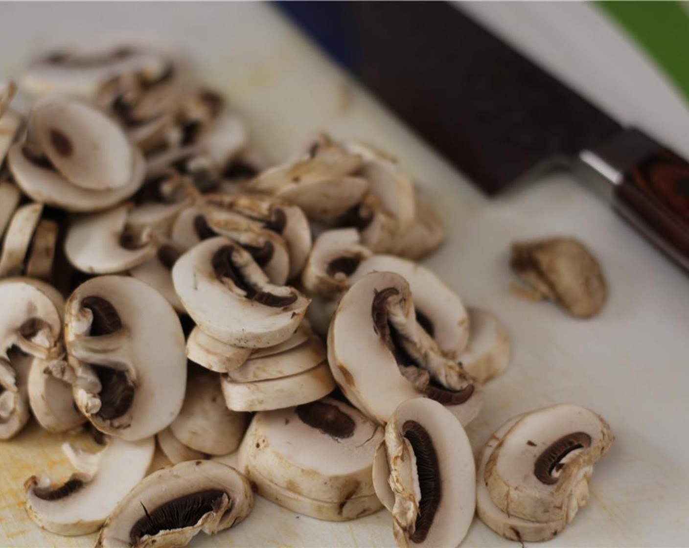 step 1 Slice the Button Mushrooms (15). Dice the Yellow Onion (1).