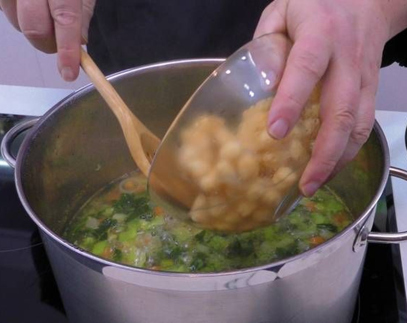 step 4 After 10 minutes have elapsed add the Pasta (to taste) and Canned Chickpeas (to taste).