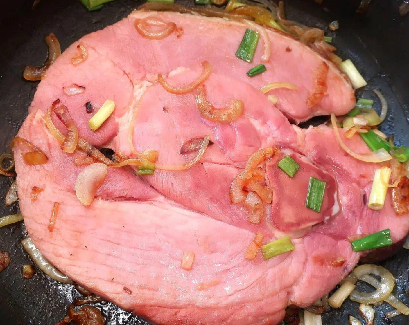 step 3 Turn the steak, cook until fully heated through, about 2-3 more minutes, depending on the thickness of the steak, without letting the onions getting too dark. Remove the steak to a warm plate.