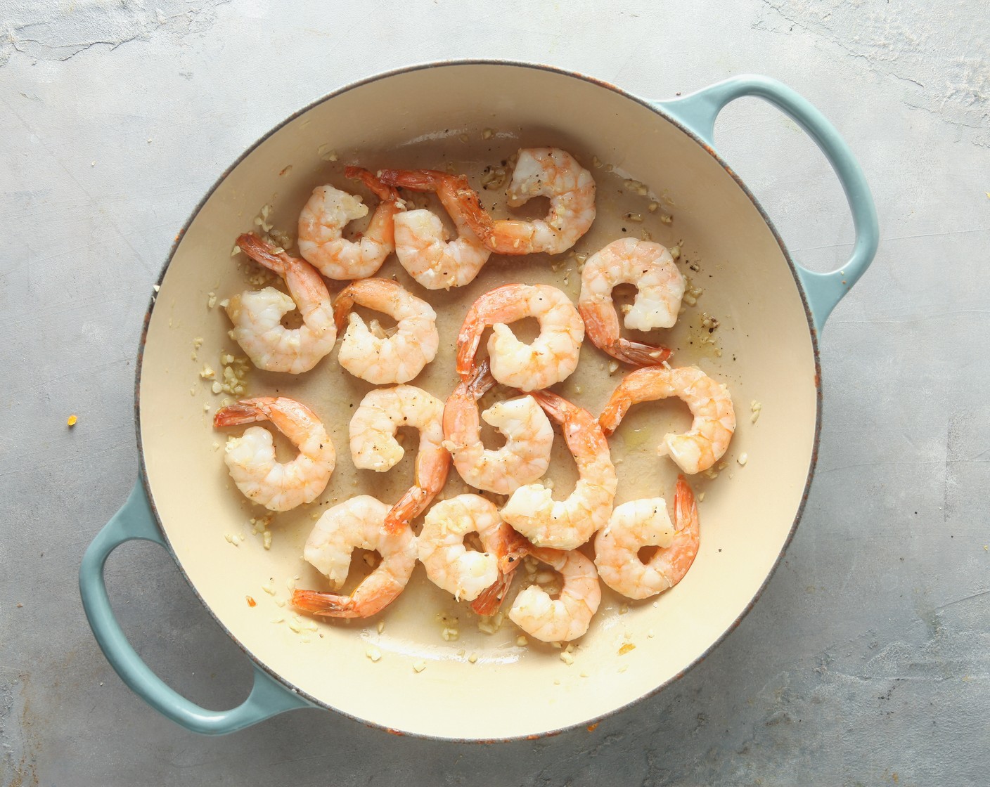 step 1 Heat the Olive Oil (2 Tbsp) in a large pan over medium-high heat. When the oil is shimmering, add the Garlic (6 cloves) and Medium Raw Peeled Deveined Tail-On Shrimp (1 bag). Cook, covered, for 4-5 minutes, or until cooked through. Transfer the shrimp to a plate.