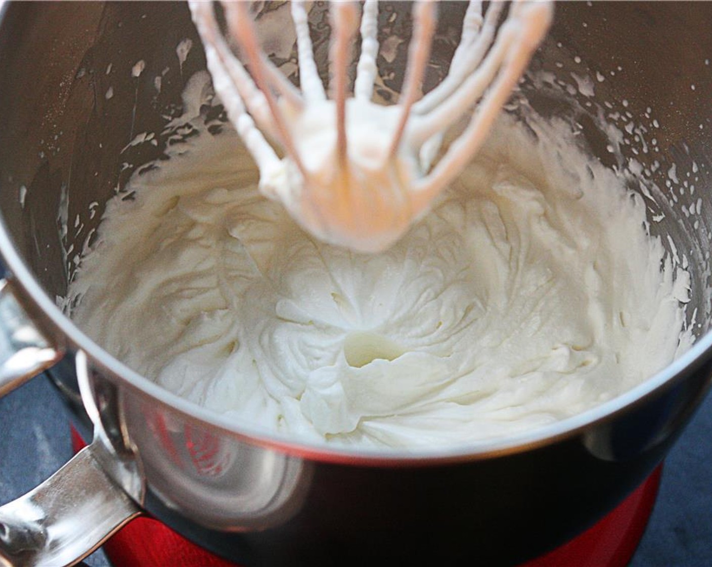 step 13 Reduce to medium-speed and drizzle the gelatin mixture into the mixer bowl. Return to high and beat until firm peaks form. Mixture will resemble Cool Whip.