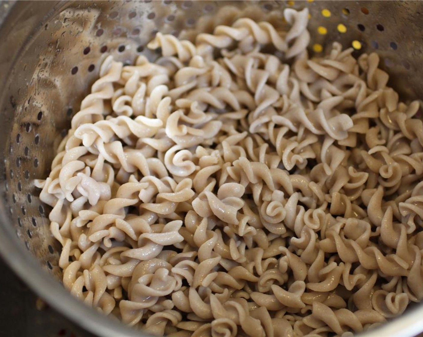 step 6 Boil the water for the pasta. Add the Fusilli Pasta (2 cups) and a dash of Olive Oil (as needed) to keep the noodles from sticking together. Boil until the noodles are cooked al dente.