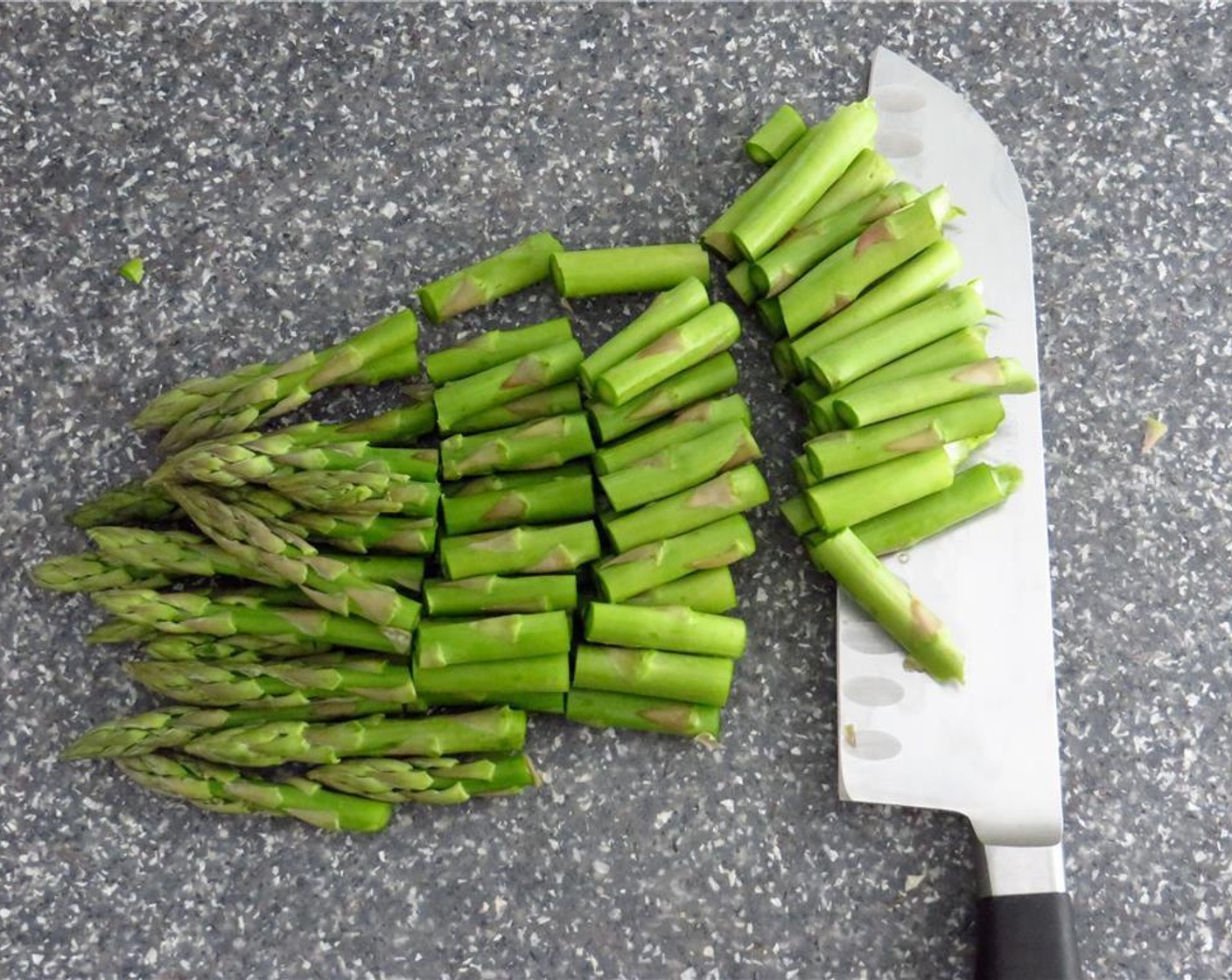 step 1 Trim the ends from the Asparagus (1 2/3 cups) and cut them into one inch pieces.  Set aside.