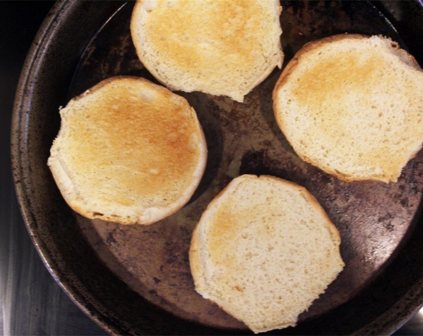 step 5 Broil the Hamburger Buns (4) on the cut side until lightly toasted.