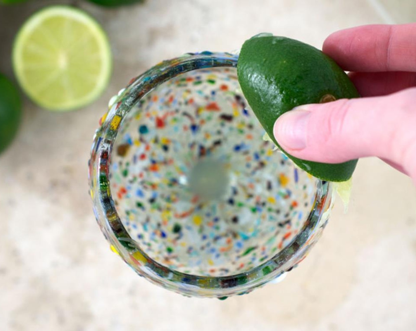 step 2 Use lime and rim the glass. This gives the sugarssss or salt something to adhere to.