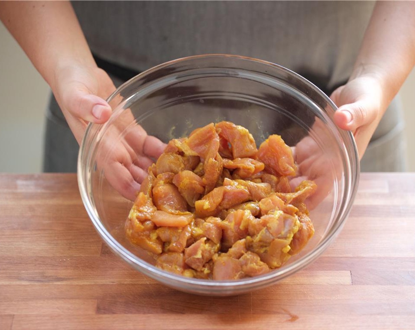 step 1 Cut the Chicken Thighs (4) into one inch pieces, and place in a medium bowl.