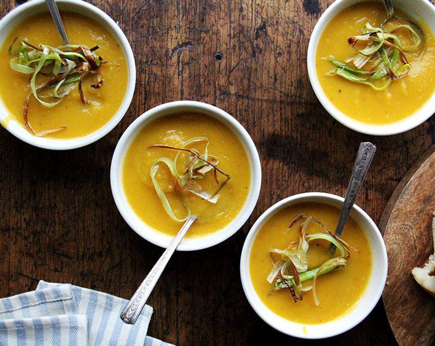 step 5 To serve, pour the soup into 6 serving bowls and garnish with the crispy leeks. Drizzle with more coconut milk if desired. Add Freshly Ground Black Pepper (to taste).