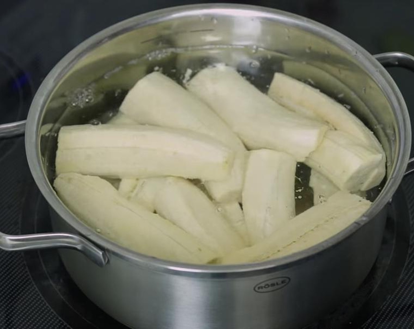 step 2 Add plantains to a large saucepan, add enough water to cover them ( I added five cups of water). Turn on the heat to high and bring to a boil.