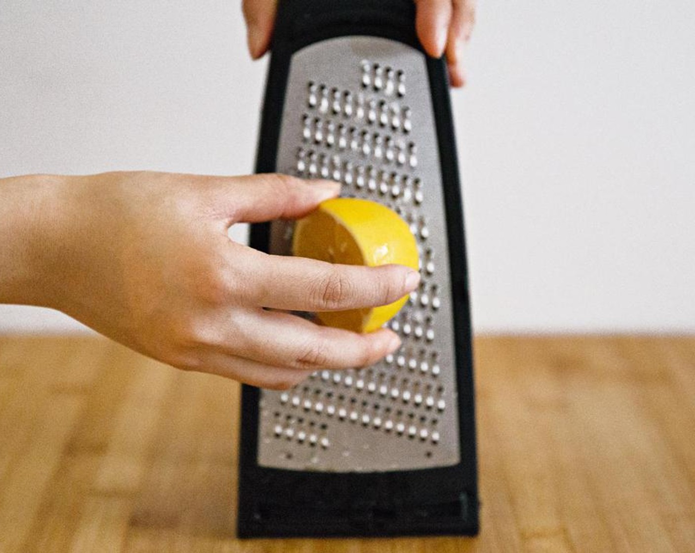 step 6 Take the other half of the lemon and grate it. Add that to the tomato to make the sauce.