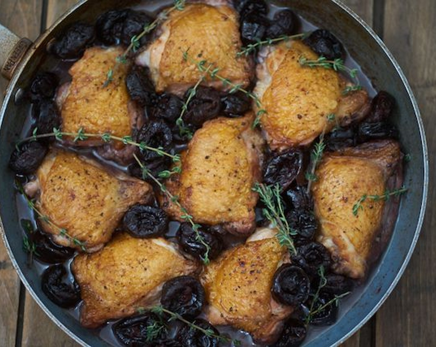 step 11 Add the chicken thighs and plums back into the skillet. Simmer over low heat until plums and chicken are heated through. To serve, place a few plums on the plate, drizzle sauce generously over plums and top with chicken.