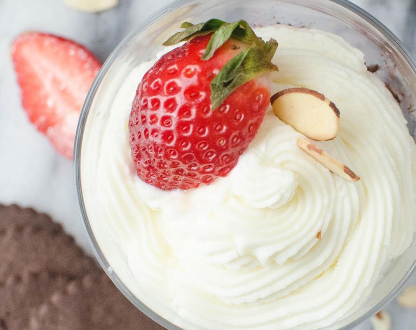 step 11 Repeat with cookies, berries and cream. Garnish with a sprinkle of toasted almonds, Fresh Strawberries (2), and a chocolate wafer.