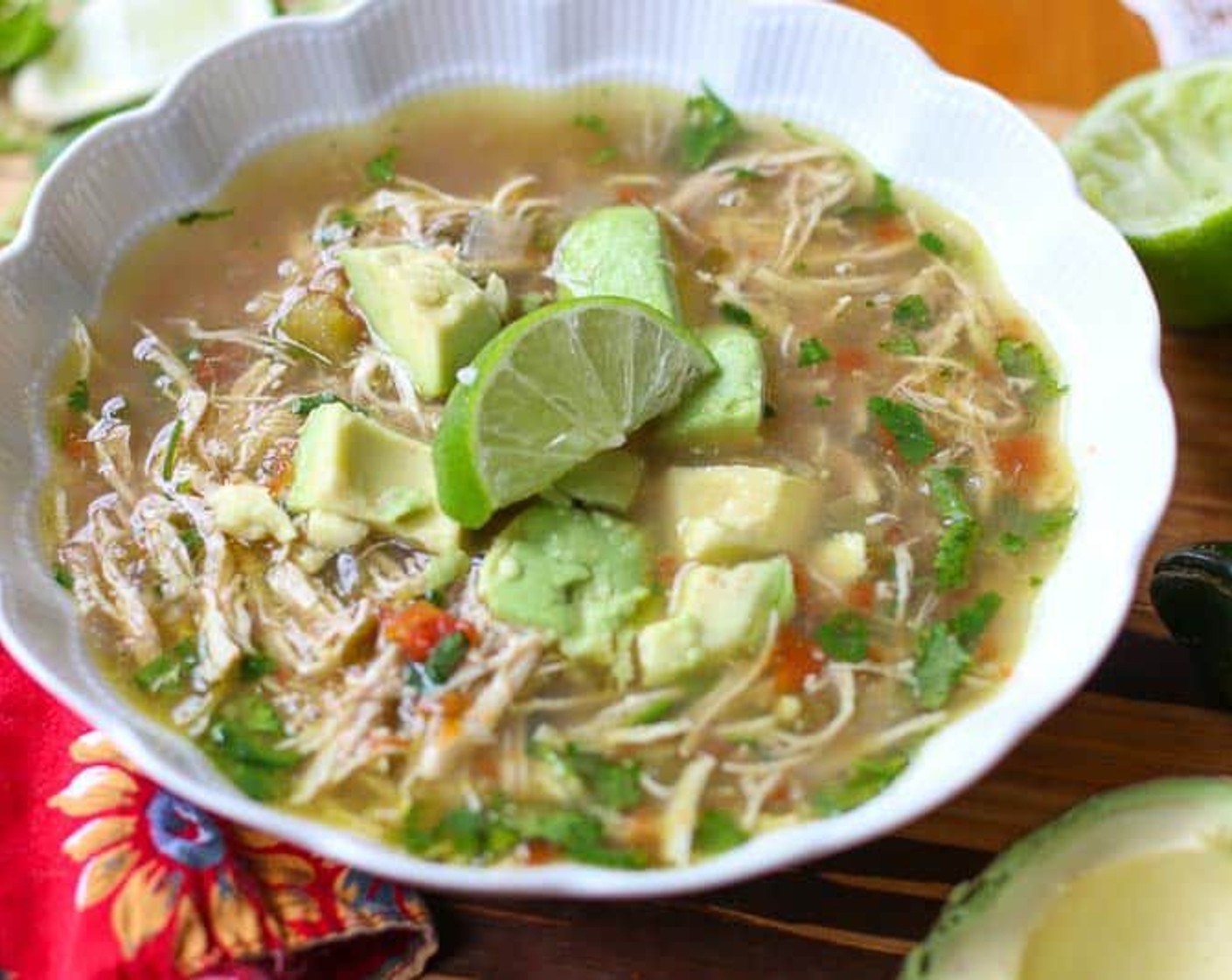 step 7 Serve soup in large bowls with slices of Avocado (1) and Lime (1).