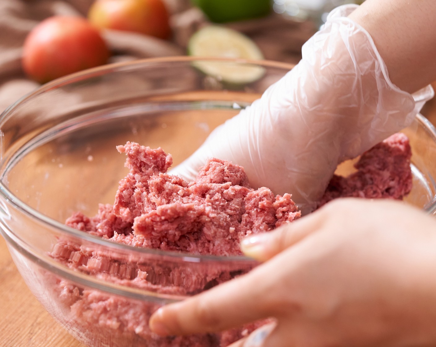 step 2 Using gloved hands, combine Ground Beef (2 lb) with the Salt (1 tsp) and Ground Black Pepper (1/2 tsp) until just combined, don’t overwork so that the meat still keeps the soft texture.