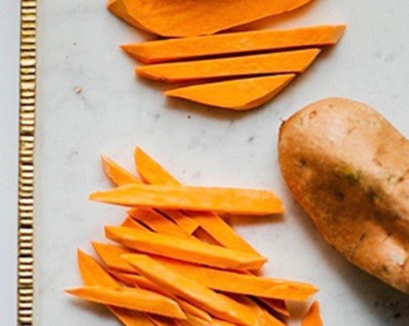 step 1 Peel Sweet Potatoes (2) and cut lengthwise into 1/4-inch (0.6 cm) thick matchsticks (erring on the side thinner fries if your knife skills are atrocious like mine and you can’t seem to make them all the exact same size).