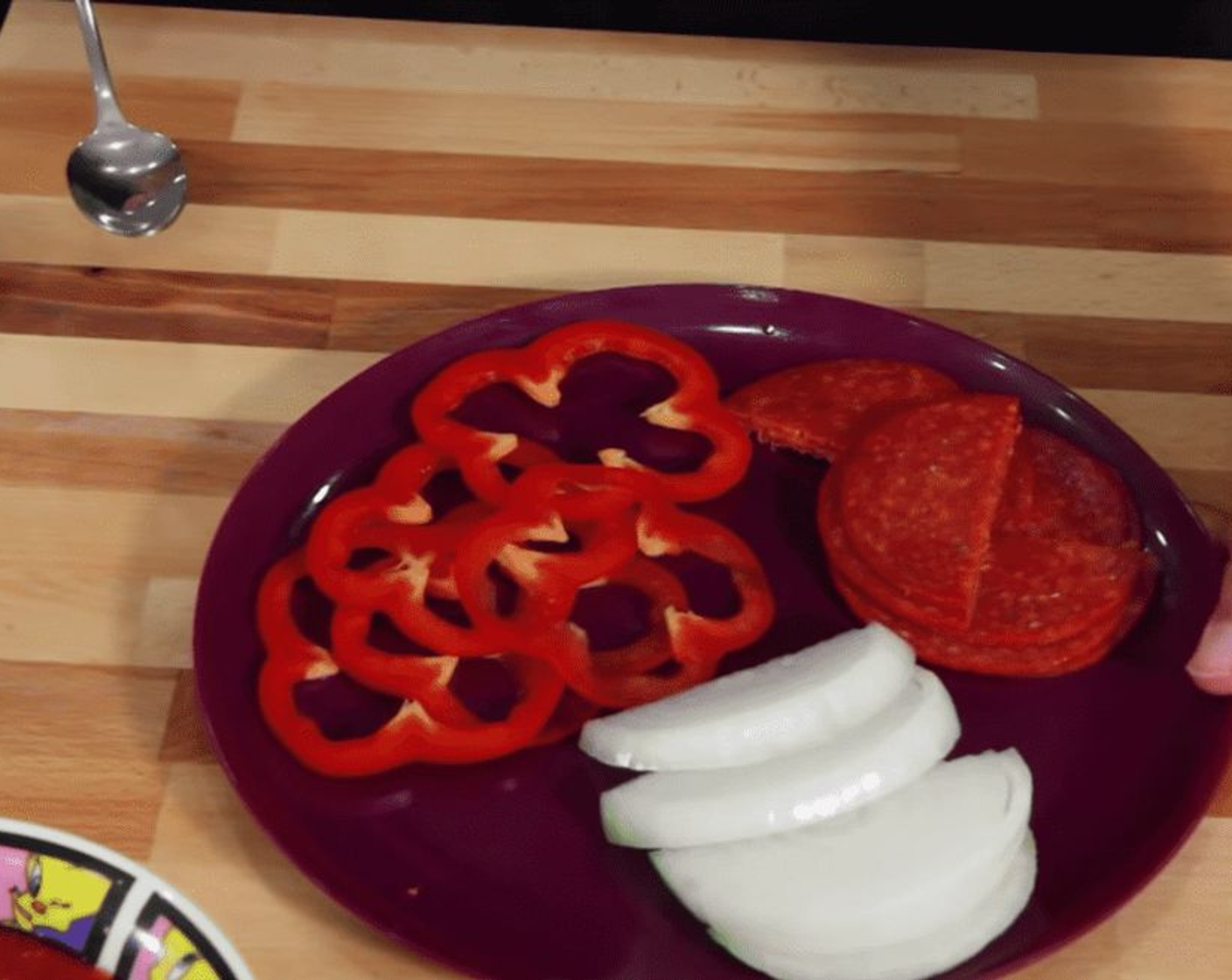 step 3 Slice the Bell Pepper (1/2) and Onion (1/4) and cut the Pepperoni Slices (4) if they're too big.