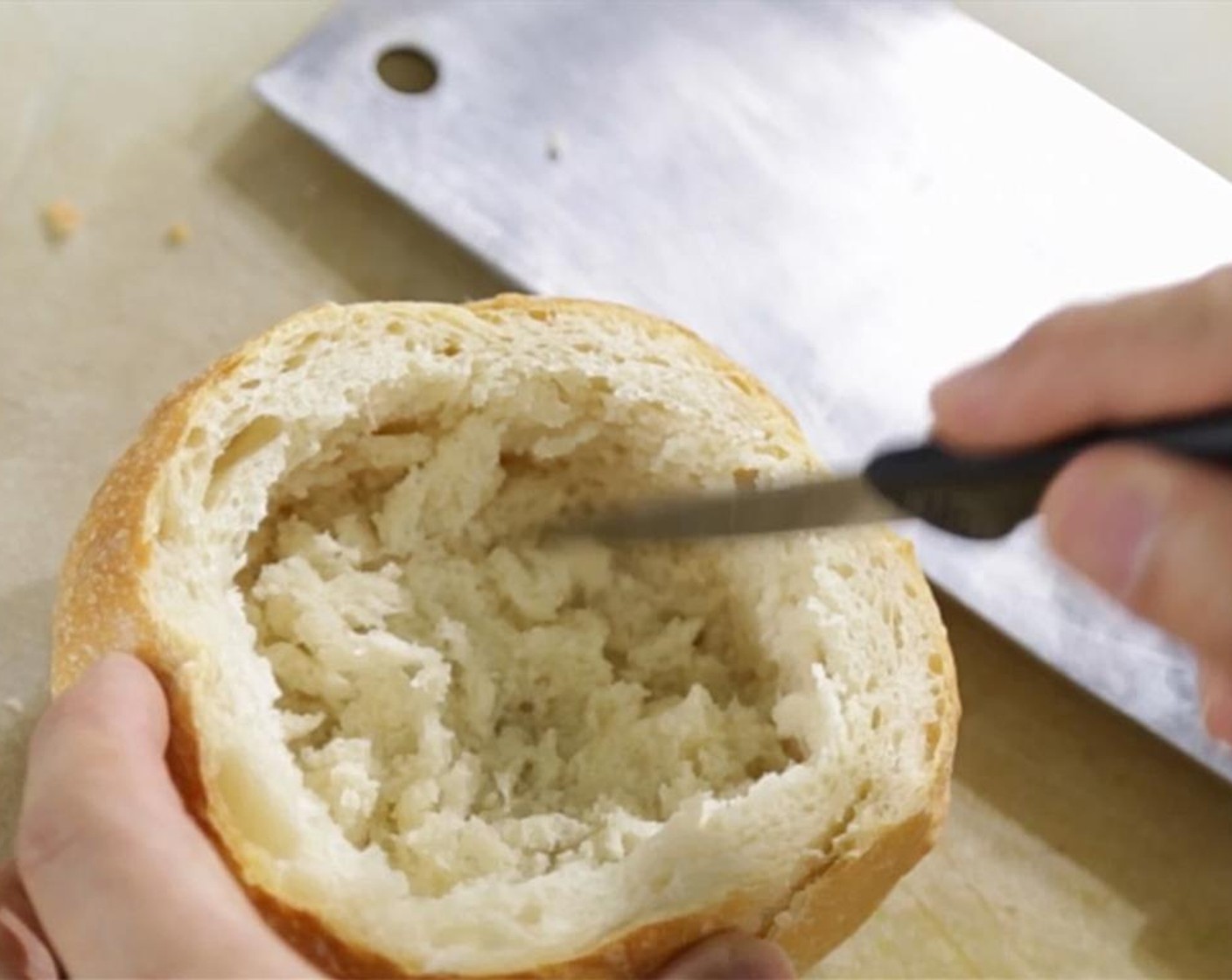 step 1 Cut the upper half off the Bread Boule (1). Carve out the bread from the bottom half to form a bowl.