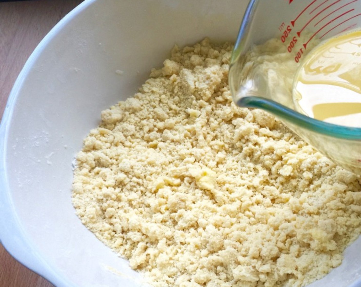 step 10 Then add the wet egg mixture into the butter flour mixture.