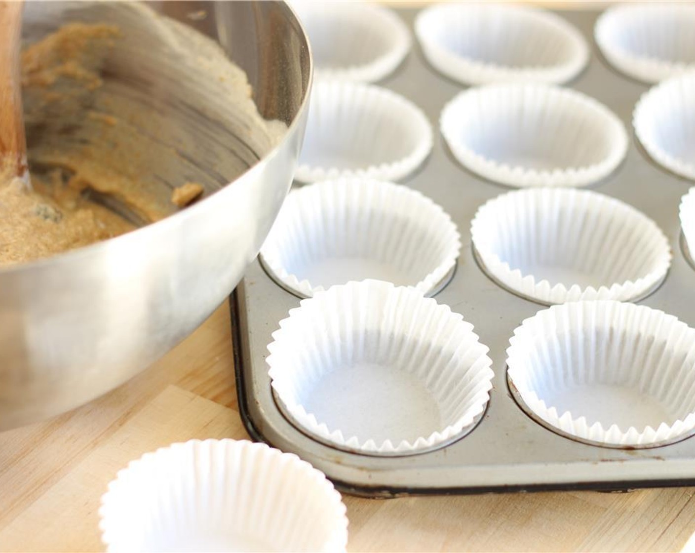 step 9 Line a muffin pan with paper liners.