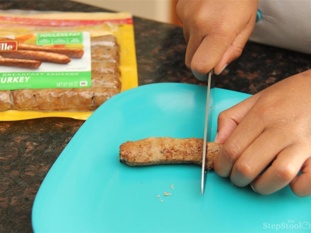 Step 2 of Turkey Sausage Popovers Recipe: Cut Turkey Breakfast Sausage Links (4) into small pieces and set aside.