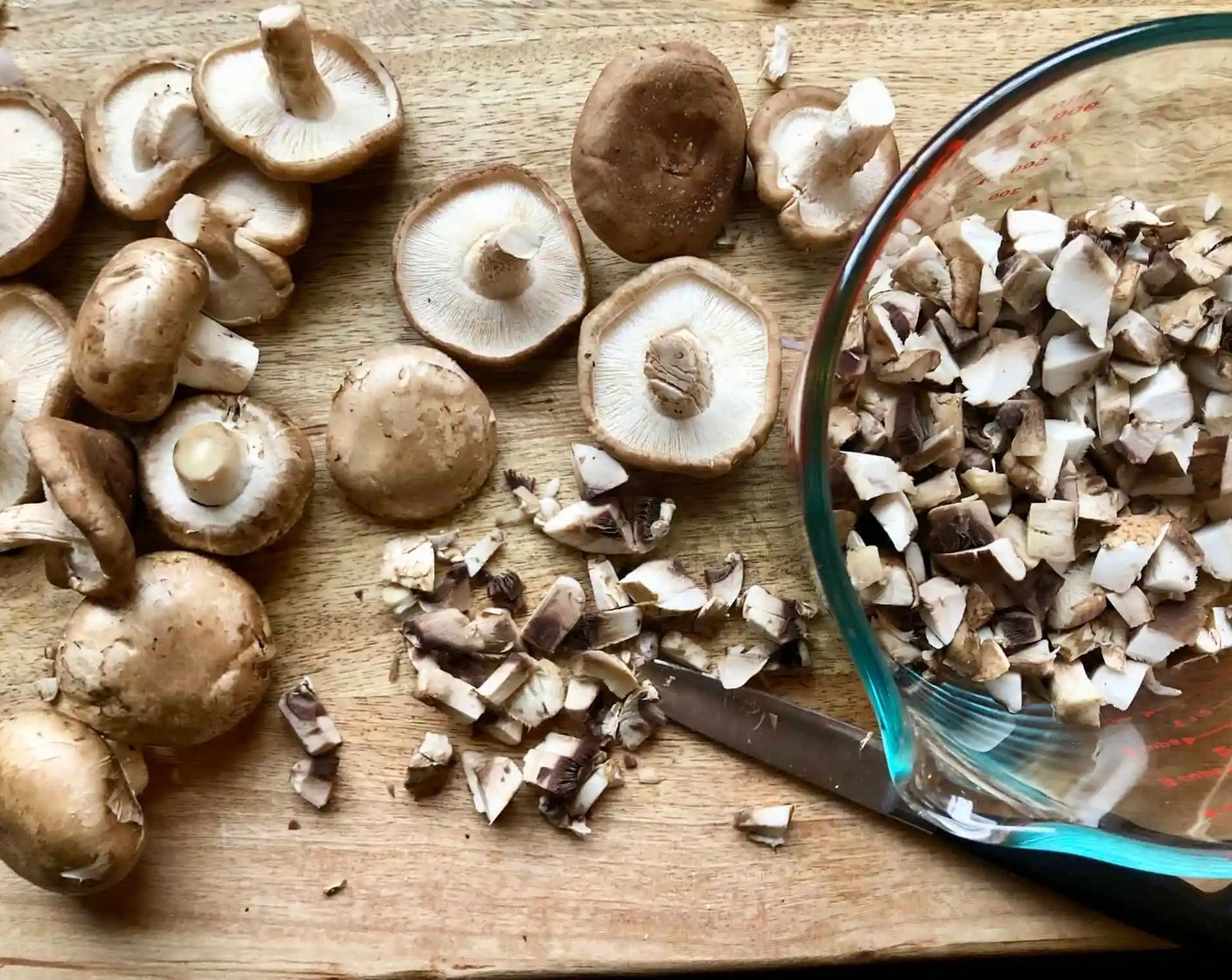 step 3 Add the Shiitake Mushrooms (4 cups), Fresh Ginger (1 piece), and Freshly Ground Black Pepper (to taste). Cook, stirring occasionally until the mushrooms have cooked down for about 5 minutes.