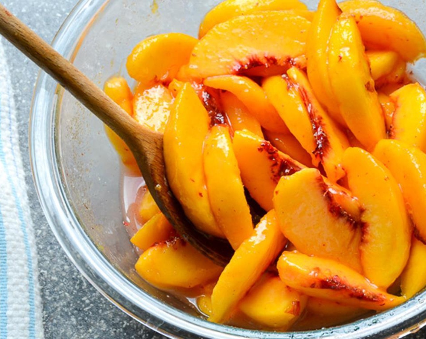 step 7 Add the spice mixture to the peaches, along with the juice from the Lemon (1). Toss until well combined.