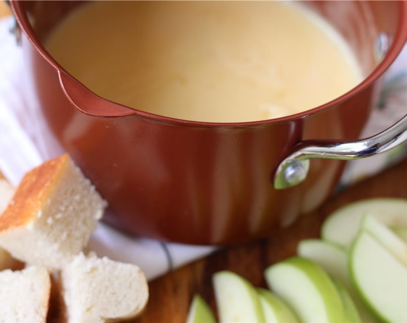 step 7 Serve immediately with bread, apples, and Crudites (to taste) if desired.