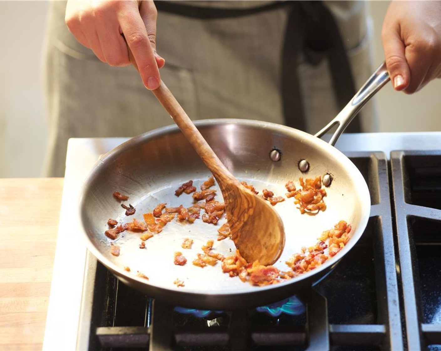 step 6 In a medium saute pan over medium high heat, add Olive Oil (1 Tbsp). When hot, add the bacon and cook for three minutes until crispy, then remove from heat.