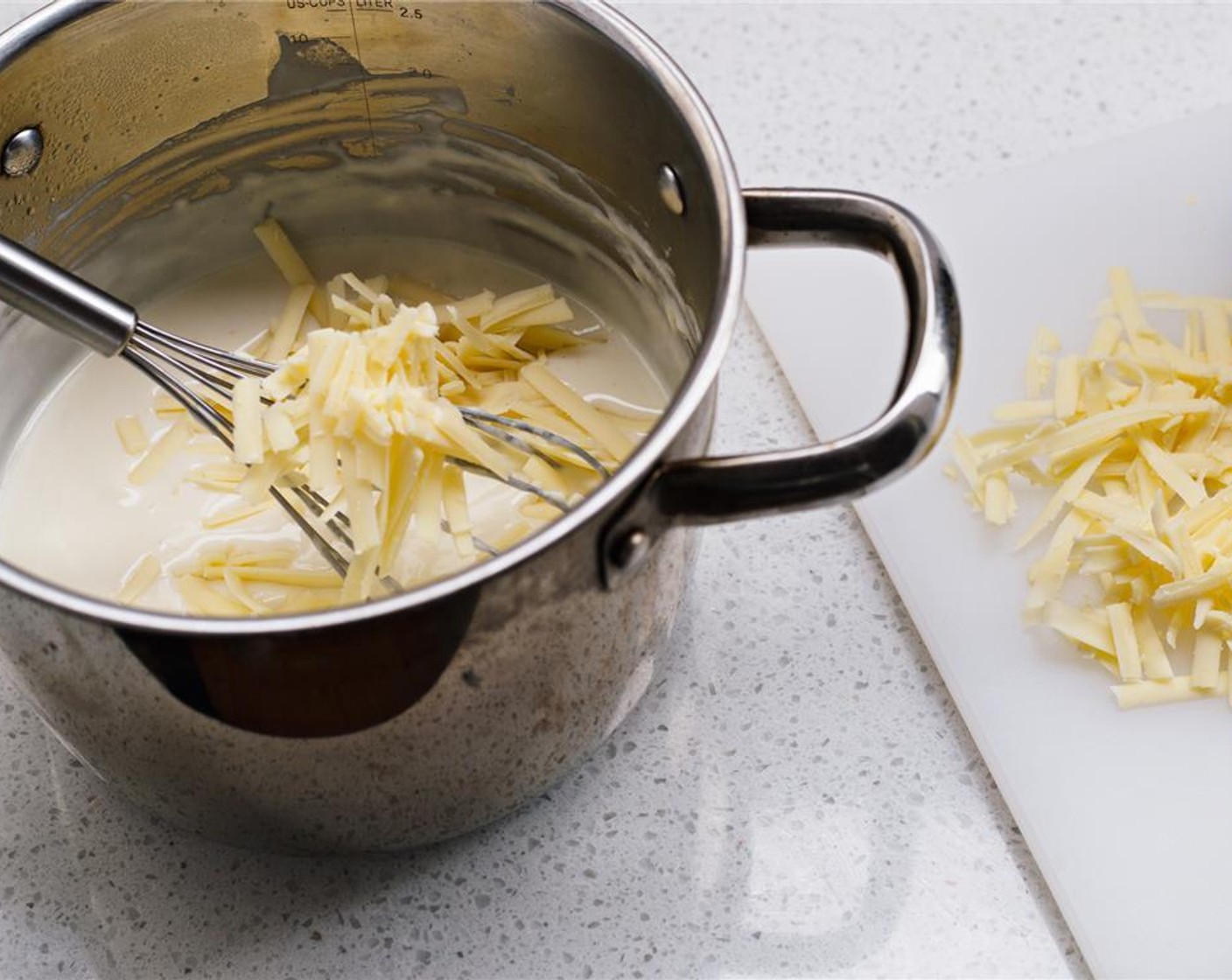 step 7 Add in Mature Cheddar Cheese (2/3 cup), and Salt (to taste) and Ground Black Pepper (to taste).