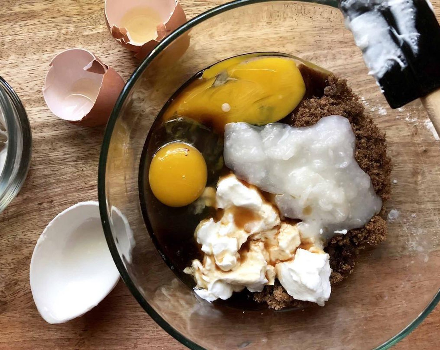 step 5 In a medium bowl, combine the Farmhouse Eggs® Large Brown Eggs (2), Coconut Oil (1/4 cup), Plain Greek Yogurt (1/4 cup), Dark Brown Sugar (1/2 cup) and Pure Vanilla Extract (1 tsp). Whisk until smooth.