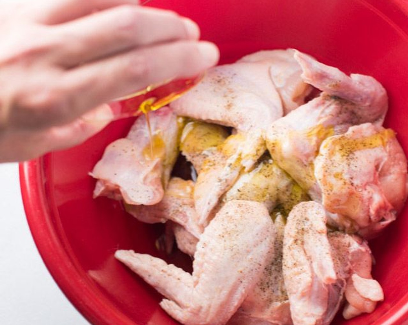 step 1 Combine in a large bowl the Chicken Wings (3 lb), Beer (1/2 bottle), Extra-Virgin Olive Oil (1/4 cup), Salt (1/8 tsp) and Ground Black Pepper (1/8 tsp). Mix until well coated.