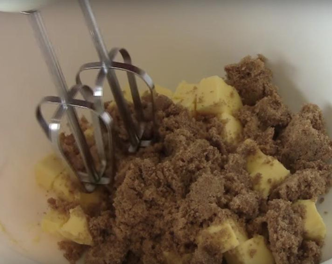 step 2 In a large mixing bowl, put Butter (6.5 oz) and Brown Sugar (1 cup). Beat them together with an electric mixer. Add in Eggland's Best Classic Eggs (3), beating the mix after adding each one. Then add in half of the Self-Rising Flour (2 cups) and Baking Powder (2 tsp) and mix them in. Mix in half of the coffee mixture. Mix in the other half of the flour and the remaining coffee mixture.